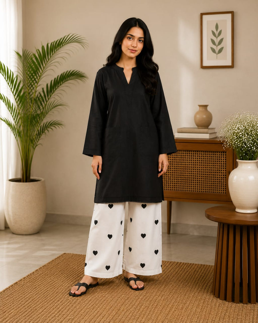 Black Women’s Kurta with White Heart-Print Trousers